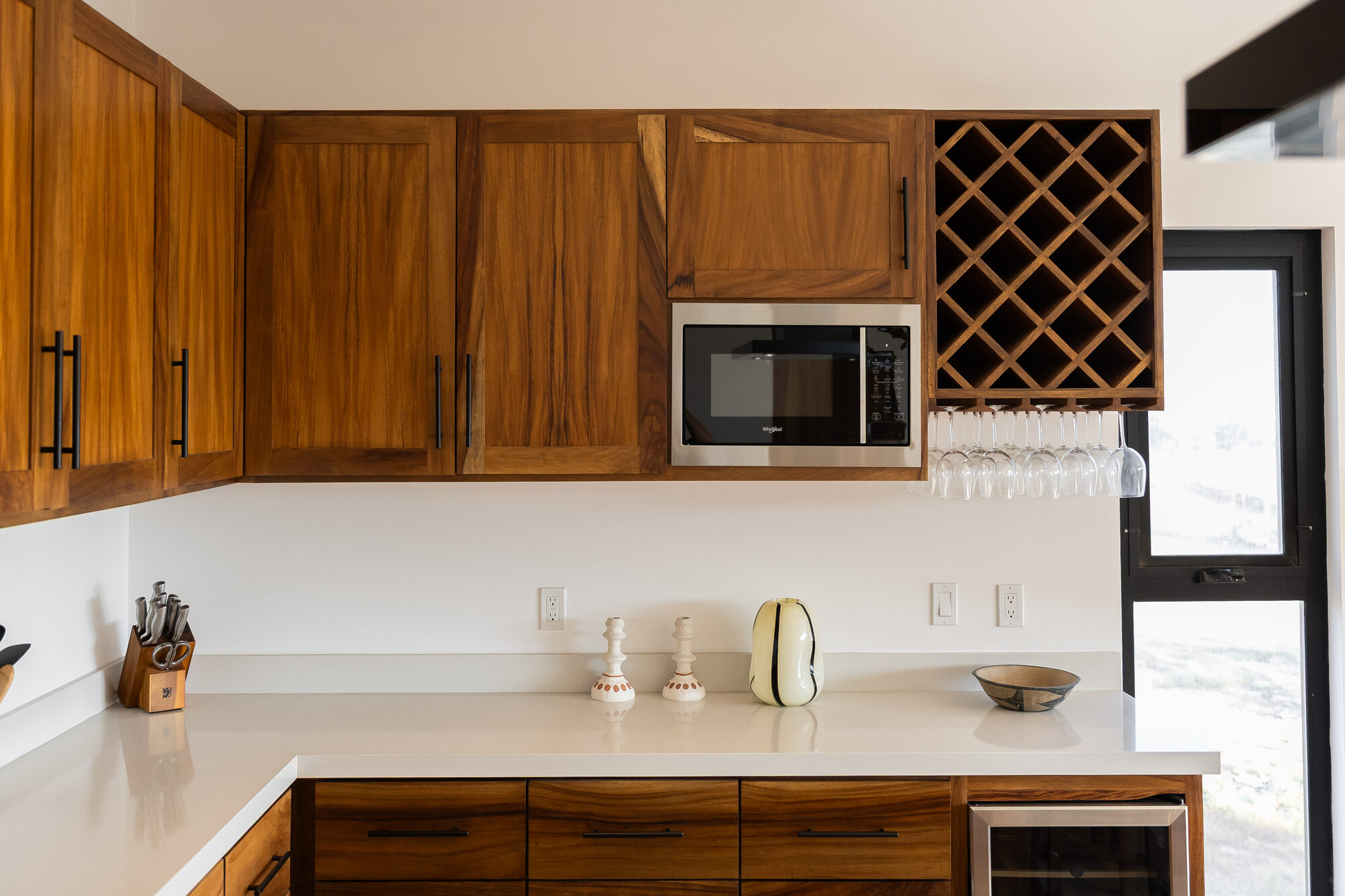 Stone kitchen counter with a coffee setup at one end